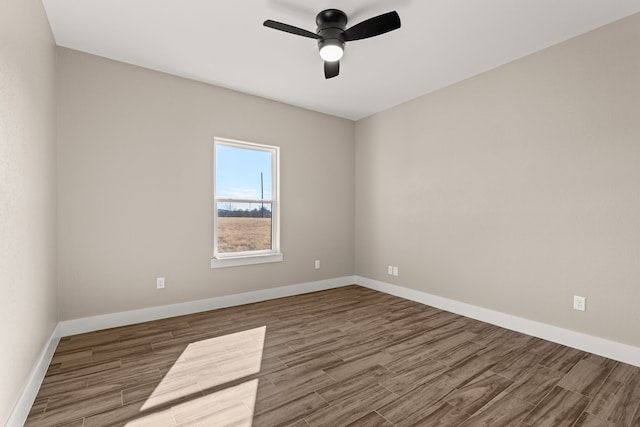 spare room with ceiling fan