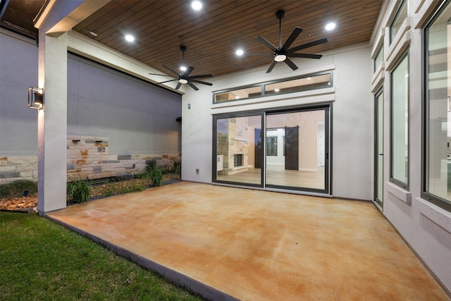 view of patio featuring ceiling fan