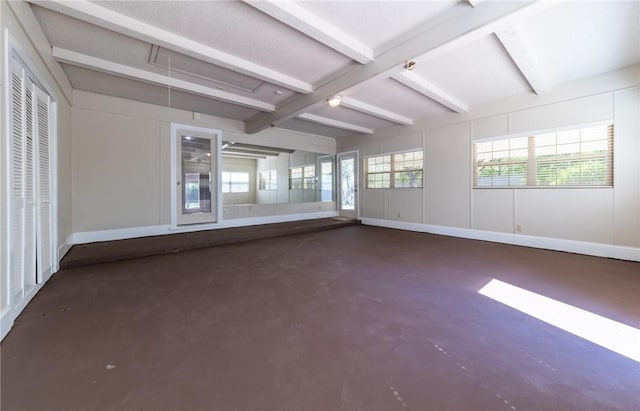 empty room with beam ceiling