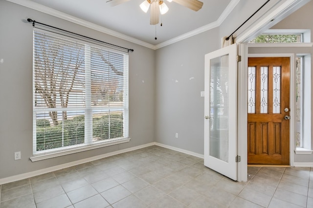 entrance foyer featuring ornamental molding, light tile patterned flooring, baseboards, and a ceiling fan