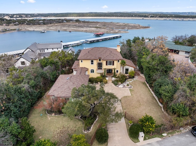 birds eye view of property featuring a water view