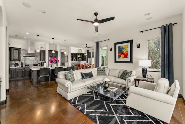 living room with ceiling fan