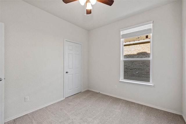 118 Grace Lilly Dr, Buda, TX 78610 - carpeted spare room with a ceiling fan and baseboards
