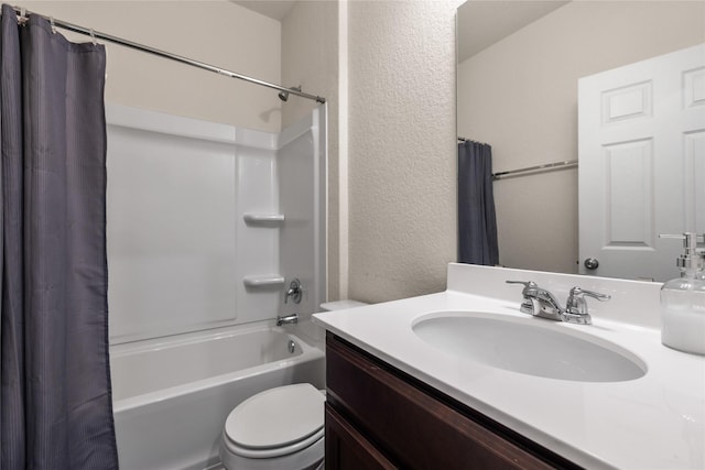 full bathroom featuring vanity, toilet, and shower / bath combo