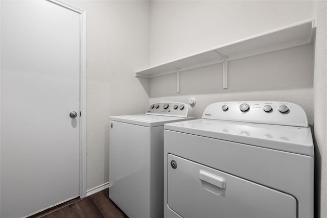 118 Grace Lilly Dr, Buda, TX 78610 - laundry area with separate washer and dryer and dark wood-style floors