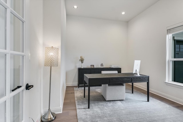 home office featuring hardwood / wood-style floors