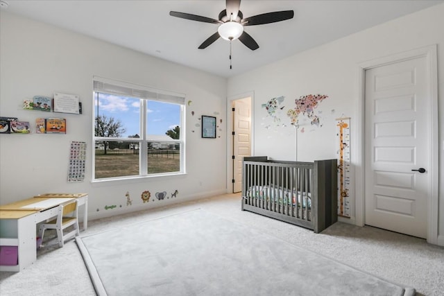 1114 Woodpark Ln, Georgetown, TX 78633 - carpeted bedroom with a crib and ceiling fan