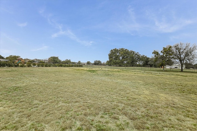 view of yard with a rural view