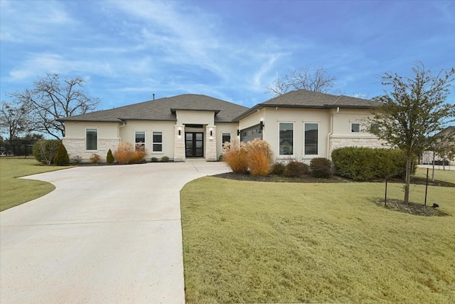 1114 Woodpark Ln, Georgetown, TX 78633 - prairie-style home with driveway, stone siding, stucco siding, and a garage