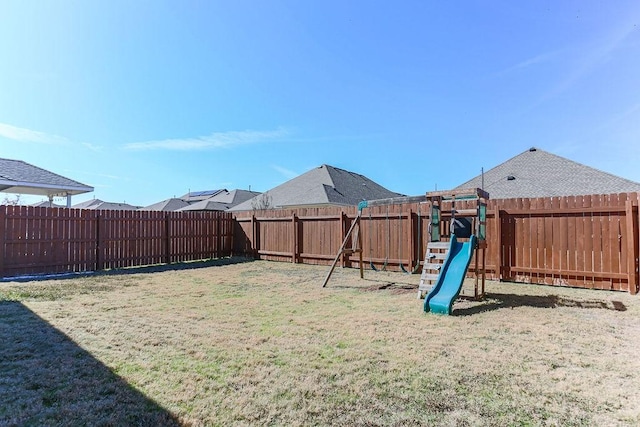 view of yard with a playground