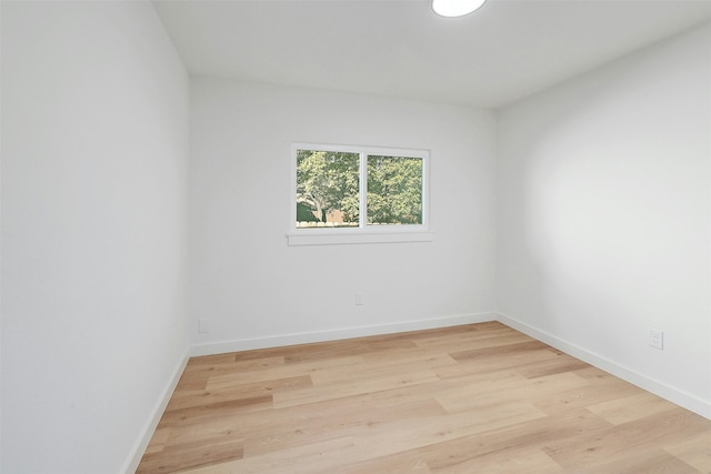 unfurnished room featuring light hardwood / wood-style floors