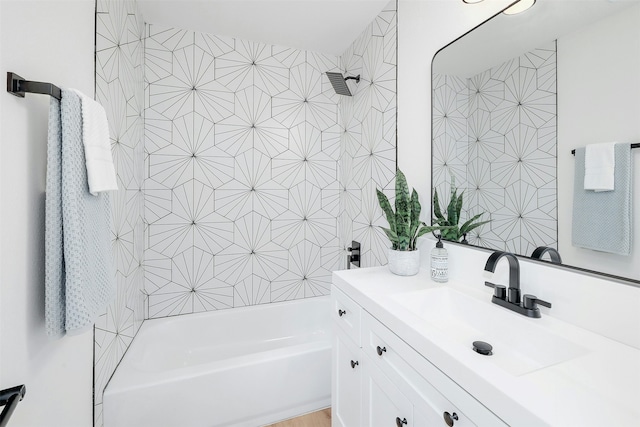 bathroom featuring vanity and bathing tub / shower combination