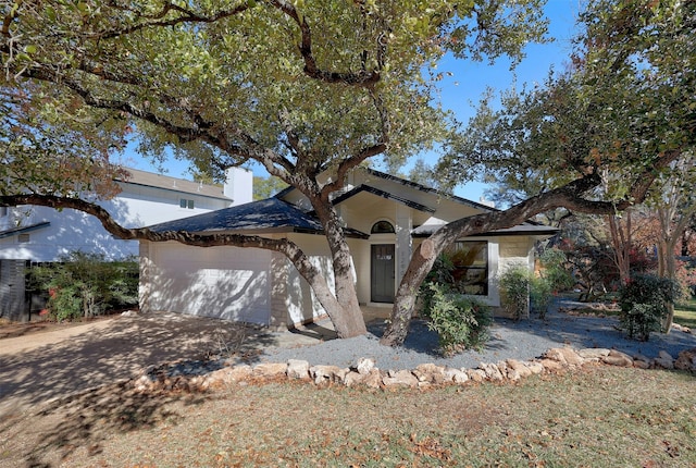 view of front of property with a garage