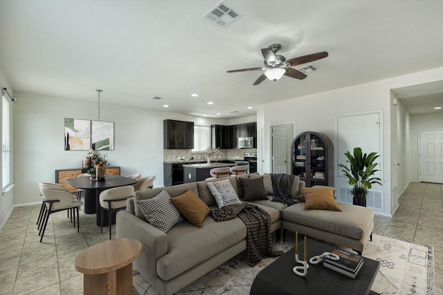 living room with ceiling fan