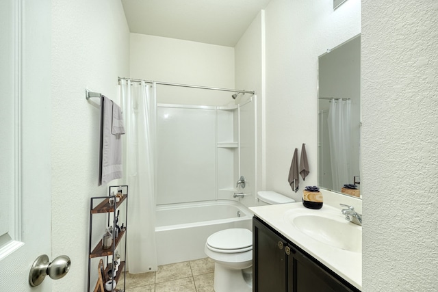 full bathroom with shower / tub combo, vanity, tile patterned flooring, and toilet