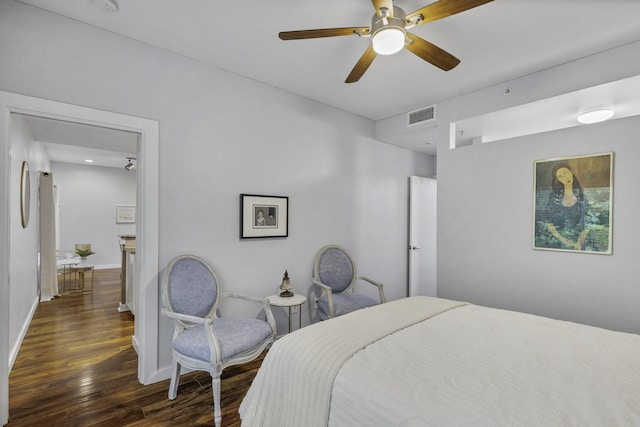 bedroom featuring dark hardwood / wood-style floors and ceiling fan