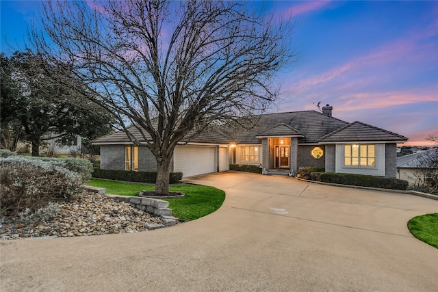 single story home with a garage