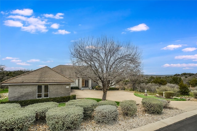 view of side of property featuring a patio