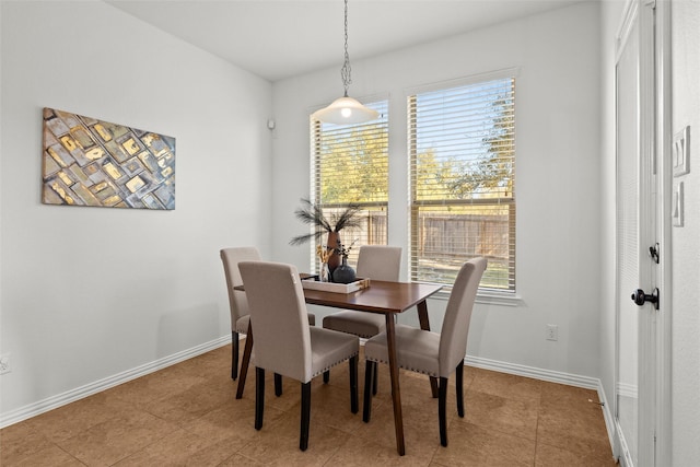 dining room featuring light tile patterned floors