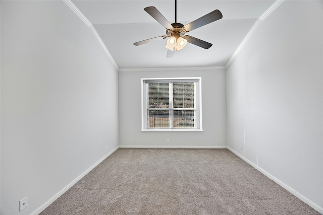 carpeted spare room featuring ceiling fan and ornamental molding