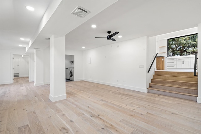 basement featuring ceiling fan and light wood-type flooring