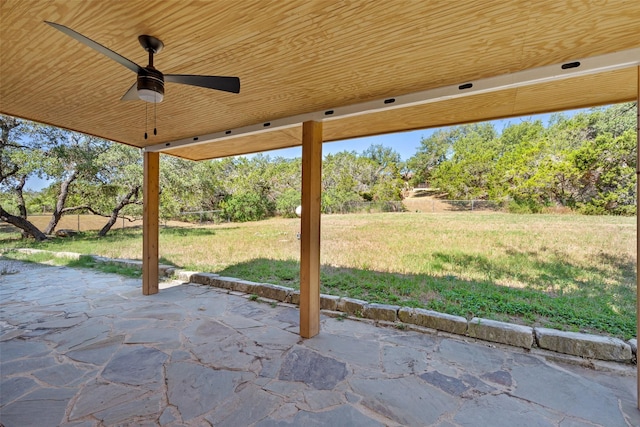 view of patio featuring ceiling fan