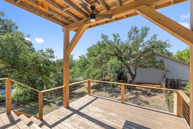 wooden deck featuring ceiling fan