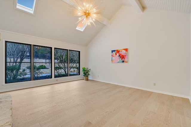 empty room featuring an inviting chandelier, a skylight, high vaulted ceiling, light hardwood / wood-style flooring, and beam ceiling