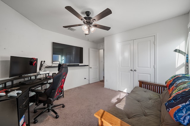 home office with light colored carpet and ceiling fan