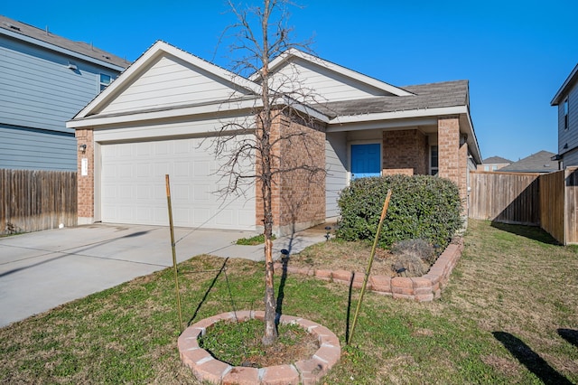 ranch-style home featuring a garage and a front yard