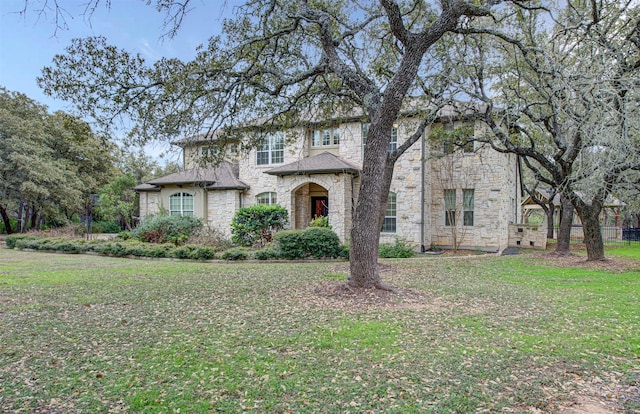 view of front of home with a front lawn