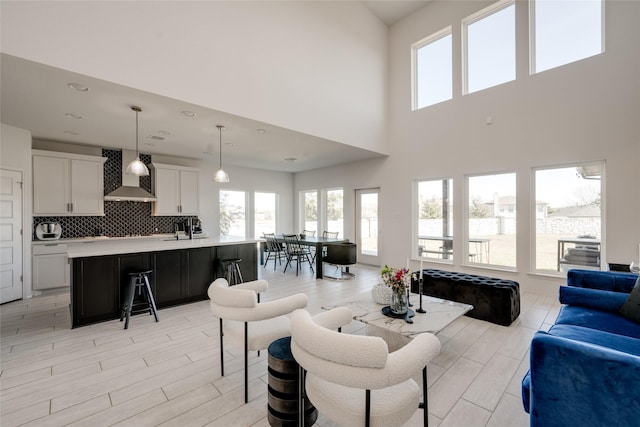 living room with a high ceiling