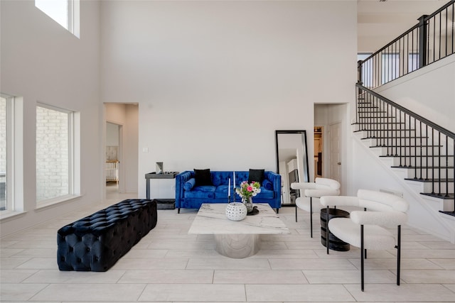 living room with a high ceiling