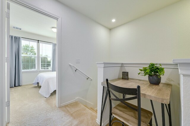 interior space featuring visible vents, recessed lighting, baseboards, and carpet floors