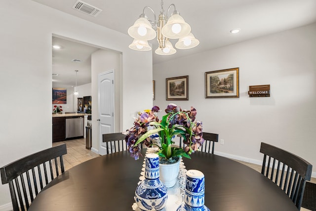 dining space featuring a chandelier