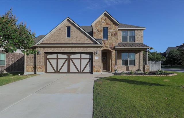 view of front facade featuring a garage and a front yard