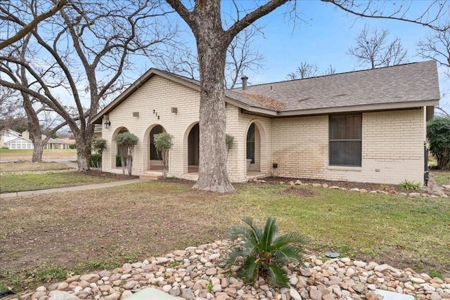 ranch-style house with a front yard