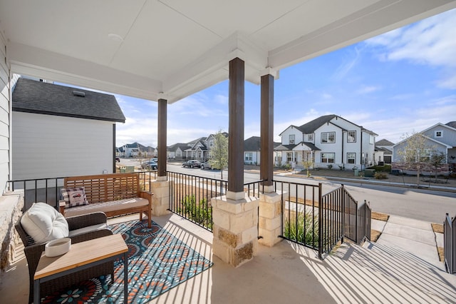 view of patio featuring a porch