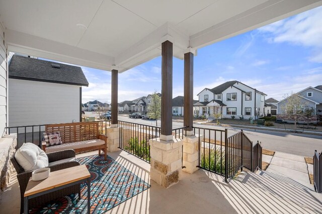 305 Ravens Crest Dr, Hutto, TX 78634 - covered porch with a residential view