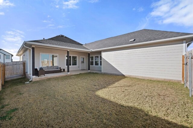 305 Ravens Crest Dr, Hutto, TX 78634 - rear view of property featuring an outdoor living space, a patio area, and roof with shingles