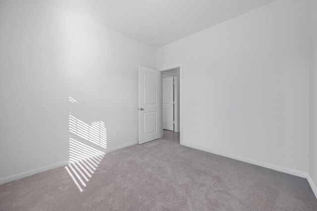305 Ravens Crest Dr, Hutto, TX 78634 - carpeted spare room featuring baseboards