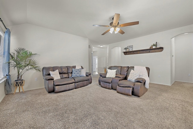 living room featuring lofted ceiling, carpet floors, and ceiling fan