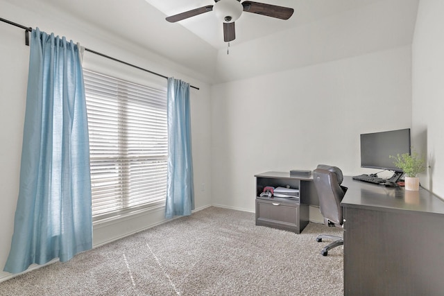 office space featuring lofted ceiling, light colored carpet, and ceiling fan