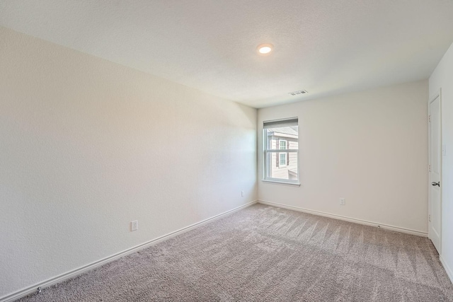 empty room featuring carpet