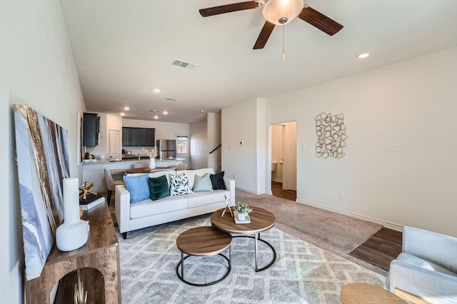 living room featuring ceiling fan