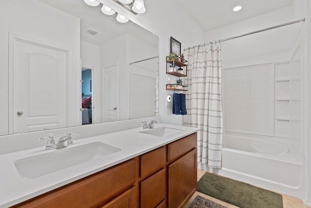 bathroom with vanity and shower / bath combo with shower curtain