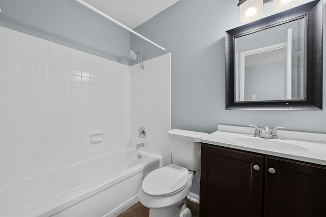 full bathroom featuring vanity, toilet, and  shower combination