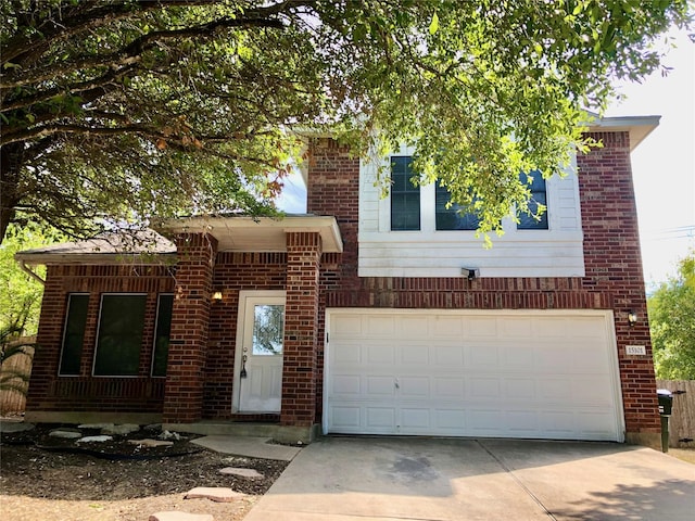 view of front of property featuring a garage