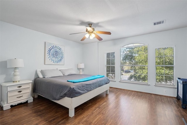 15101 Sweet Caddies Dr, Pflugerville, TX 78660 - bedroom with dark wood finished floors and ceiling fan