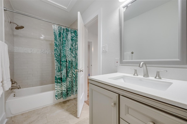 bathroom featuring shower / tub combo and vanity